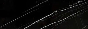 Nero Marquina 4x12 polished black marble subway tile with white veining for backsplashes.