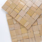 Beige zellige mosaic tiles arranged in a herringbone pattern on a white background