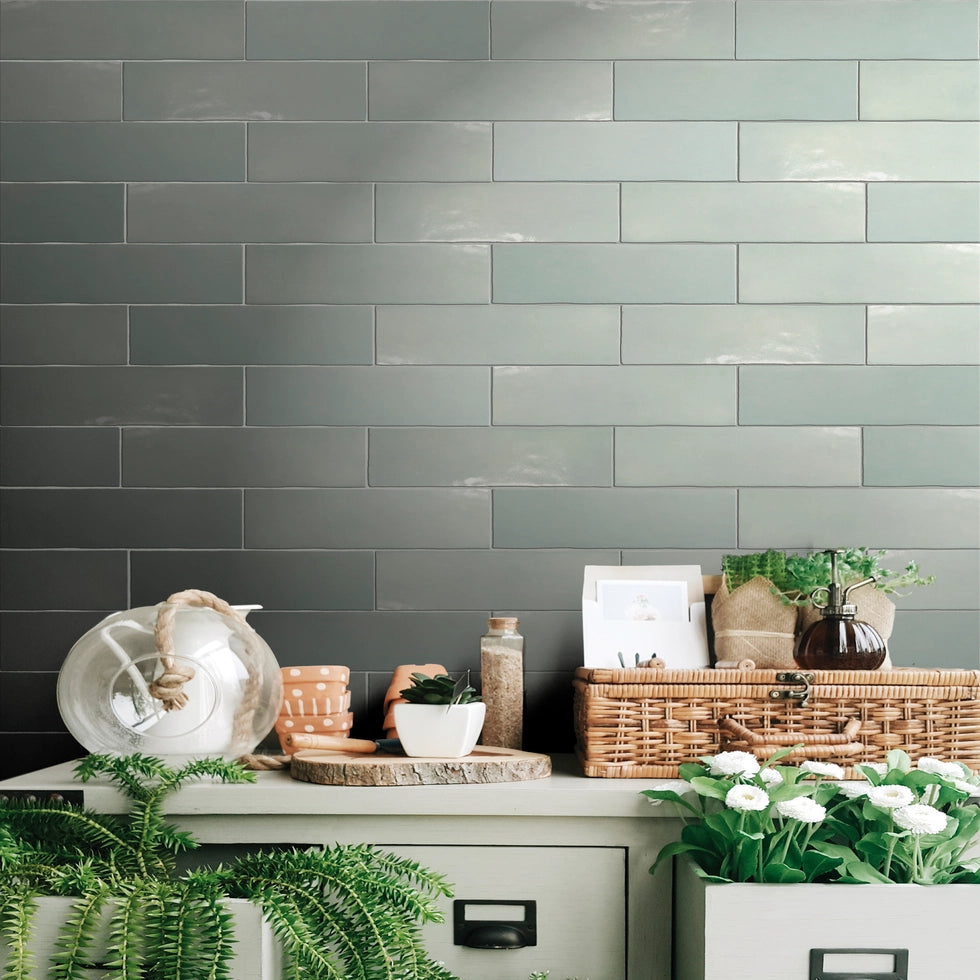 Medina Green 2.5x8 ceramic wall tile bringing lush Moroccan hues to residential Laundry room wall.