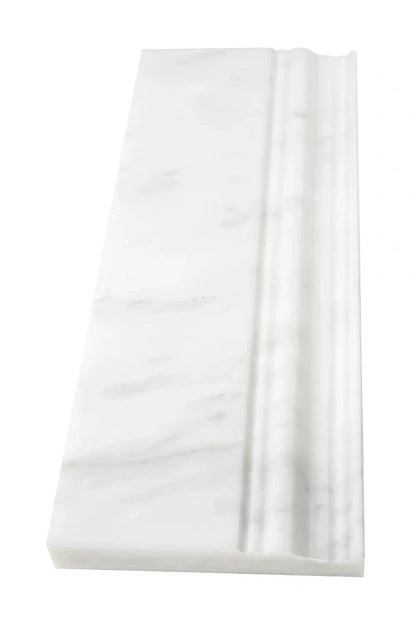 Oriental White Marble Baseboard in 4 ¾ x 12 inches, polished and honed finish with subtle gray veining.