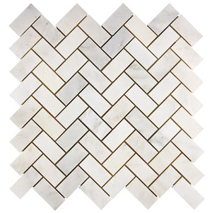 Oriental White marble 1×2 herringbone mosaic installed in a polished interior application.