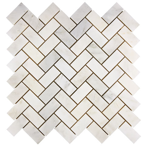 Oriental White marble 1×2 herringbone mosaic installed in a polished interior application.