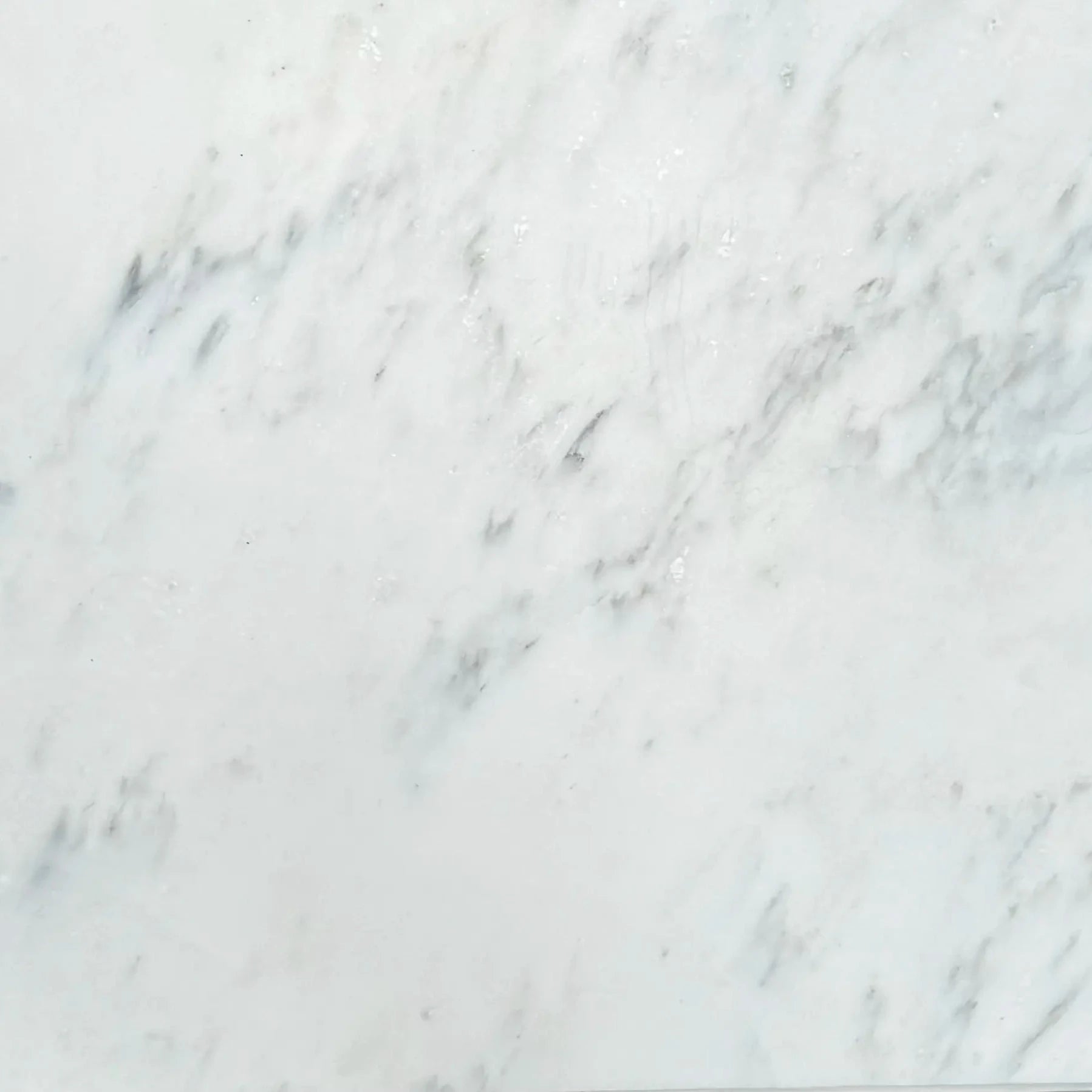 Oriental White 24×24 marble tile finish reference.