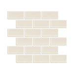 Ivory Satin 2x4 glass mosaic tile from the Radiant Surfaces Collection, creating a warm and elegant backsplash.