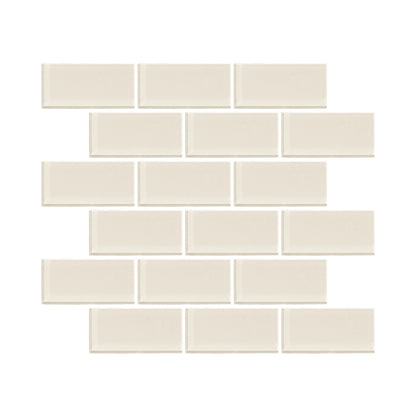 Ivory Satin 2x4 glass mosaic tile from the Radiant Surfaces Collection, creating a warm and elegant backsplash.