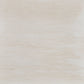 Desert Ivory 24x24 large-format porcelain tile adding warmth and sophistication to a dining room floor.