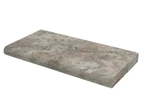 Silver Travertine Pool Coping – Tumbled finish, silver-gray tones, available in 16”x24”x1 1/4”, perfect for pools and outdoor accents.