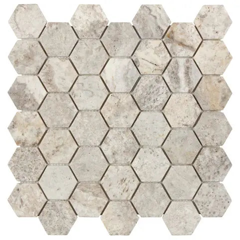 Silver Travertine 2-inch Hexagonal Mosaic Tile – Tumbled finish, silver-gray tones, ideal for walls, backsplashes, and shower floors.