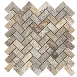 Silver Travertine 1x2 Herringbone Mosaic Tile – Tumbled finish, elegant silver-gray tones, perfect for walls, backsplashes, and showers.