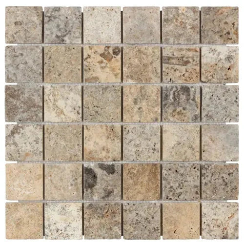 Silver Travertine 2×2 tumbled mosaic with rustic silver-gray texture.