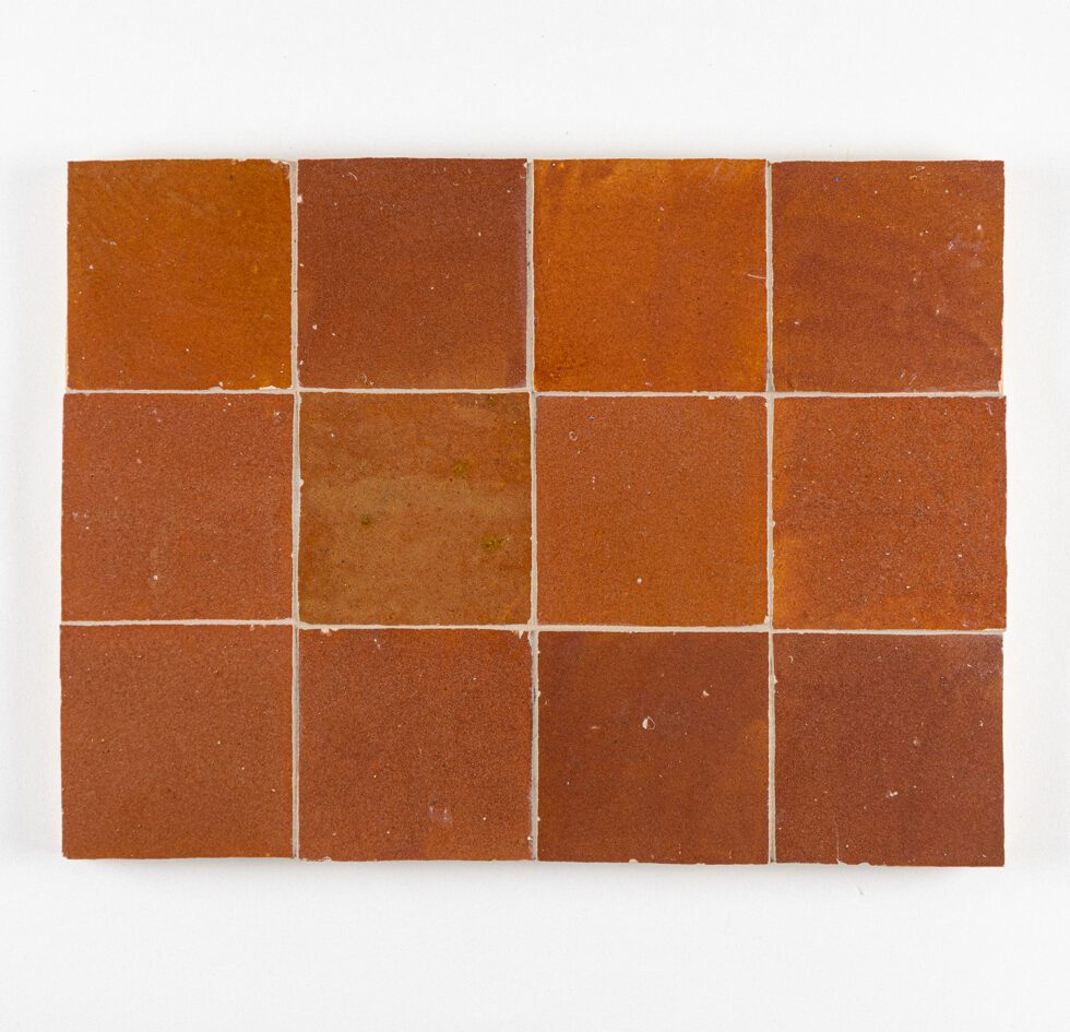 Grid of terracotta tiles on a white background
