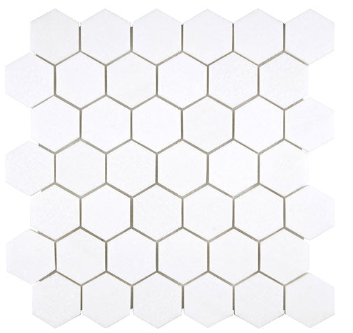 White Thassos 2-Inch Hexagon Mosaic with collection installation in brilliant white natural marble.