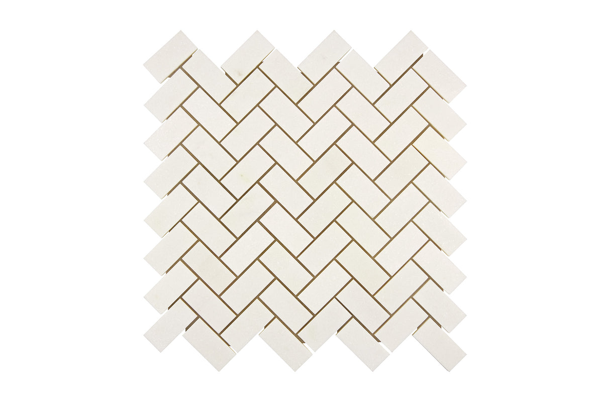 White Thassos marble 1×2 herringbone mosaic sheet in polished and honed finishes, bright pure white.