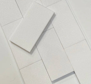 White Thassos marble subway tile in a 3x6 size, showcasing its smooth and flawless white finish, ideal for backsplashes and modern wall designs.