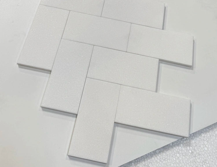 Polished White Thassos marble subway tiles in a 3x6 size, ideal for creating timeless and luxurious interior spaces.