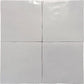 Pearl Gray 4x4 ceramic tile bringing warm, natural tones to a cozy living room.