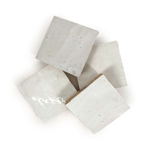 Casablanca White glossy handmade Moroccan Zellige 4×4 square wall tile in a stacked layout.