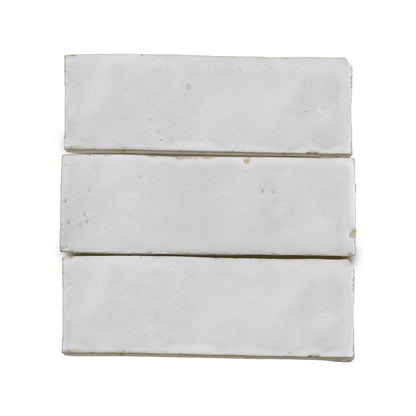 Zellige Wall Tiles – Moroccan Handcrafted Elegance_Sahara Cream color in 2x6_ trio tile showcasing the variation of color and the hand-cut size