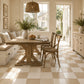 Adeline Checkerboard Zellige Tile installed in a bright European breakfast room featuring Warm Sand and Ivory handcrafted Moroccan Zellige.