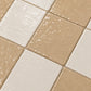 Close-up detail of Adeline Checkerboard Zellige Tile highlighting handmade texture, glaze variation, and artisan craftsmanship.