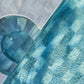 SeraPool Relax pool & spa installation showing curved spa steps with blue-green porcelain pool tile and gray pool deck coping