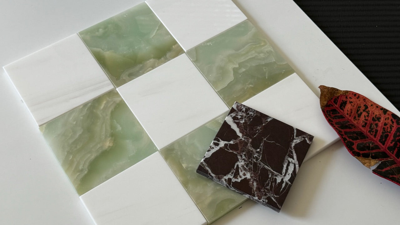 Checkerboard tile pattern showcasing Bianco Dolomite marble and Green Onyx tiles. The soft green hues of the Onyx provide a calming effect, while the sleek white Dolomite tiles add sophistication. Ideal for high-end interior designs and luxurious backsplashes.
