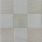 Vanilla Onyx and Bianco Dolomite tiles in a refined checkerboard pattern, perfect for luxurious residential and commercial spaces. The soft blend of cream and white tiles adds sophistication to any room.