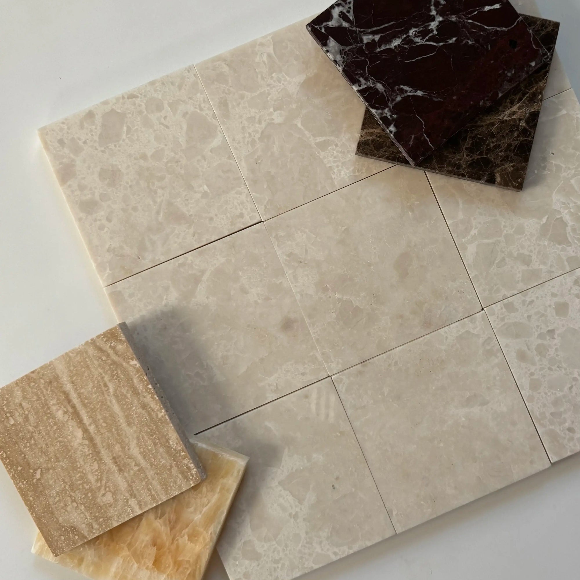 Creamy beige marble tiles featuring subtle veining and a polished finish. Ideal for adding warmth to modern interiors in flooring, walls, and backsplashes.