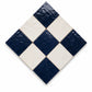 Camille Checkerboard Zellige Tile displayed in a 45-degree diamond layout featuring Indigo and Ivory Moroccan Zellige.