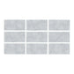 SeraPool Relax Cemento Grey porcelain pool tile color sample showing 9 face variations with concrete-look texture.