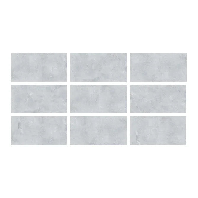 SeraPool Relax Cemento Grey porcelain pool tile color sample showing 9 face variations with concrete-look texture.