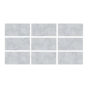 SeraPool Relax Cemento Grey porcelain pool tile color sample showing 9 face variations with concrete-look texture.