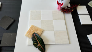 Checkerboard application pairing Bianco Dolomite marble with White Onyx tiles.