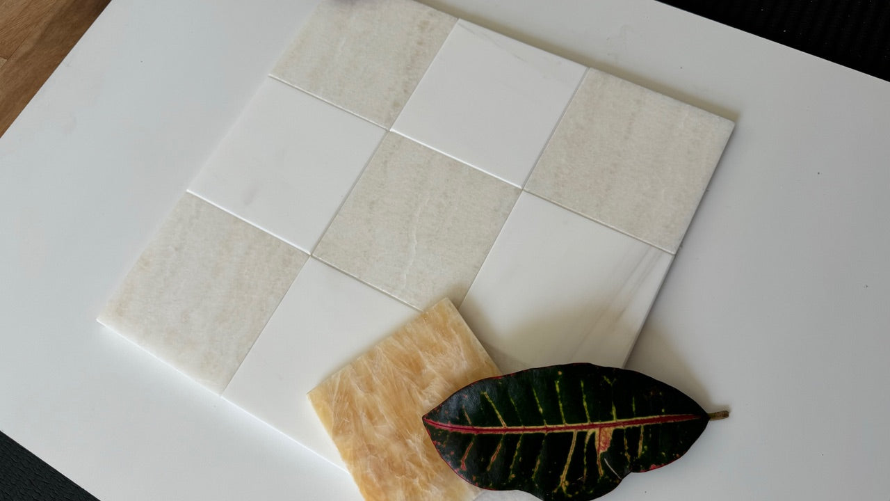 A luxurious checkerboard pattern created from White Onyx and Bianco Dolomite tiles, ideal for bathrooms or kitchen backsplashes. The rich textures and subtle color variations make it a standout feature for any space.