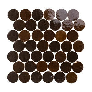 Zellige mosaic pattern of dark brown circular tiles on a white background
