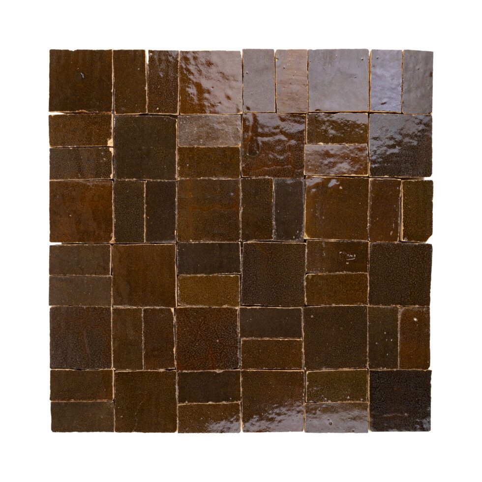 Mosaic zellige tile pattern with brown squares on a white background