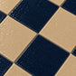 Close-up detail of Genevieve Checkerboard Zellige Tile highlighting handmade texture, glaze variation, and artisan craftsmanship.