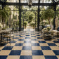 Genevieve Checkerboard Zellige Tile installed in a luxury conservatory featuring Indigo and Warm Sand handcrafted Moroccan Zellige.