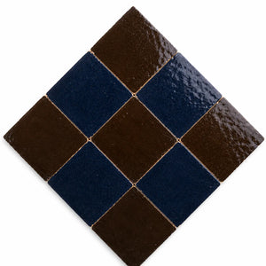 Odette 4×4 Zellige checkerboard in a 45-degree diamond layout, Indigo & Cacao.