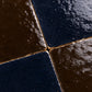 Close-up detail of Odette Checkerboard Zellige Tile highlighting handmade texture, glaze variation, and artisan craftsmanship.