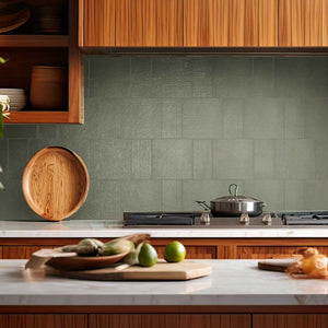 Stria Olive Sage textured porcelain tile installed as a kitchen backsplash.