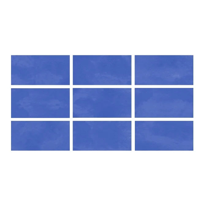 SeraPool Relax pastel cobalt porcelain pool tile, 9-face texture variation sample (blue tones).