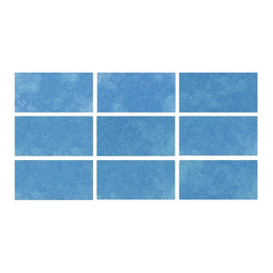 SeraPool Relax porcelain pool tile sample board showing 9 face variations in blue, arranged in a 3×3 grid.