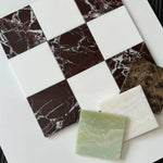 Elegant marble checkerboard pattern with deep red Rosso Levanto marble tiles and classic white Bianco Dolomite marble tiles. The dynamic color combination creates a timeless aesthetic perfect for upscale interiors or statement flooring.