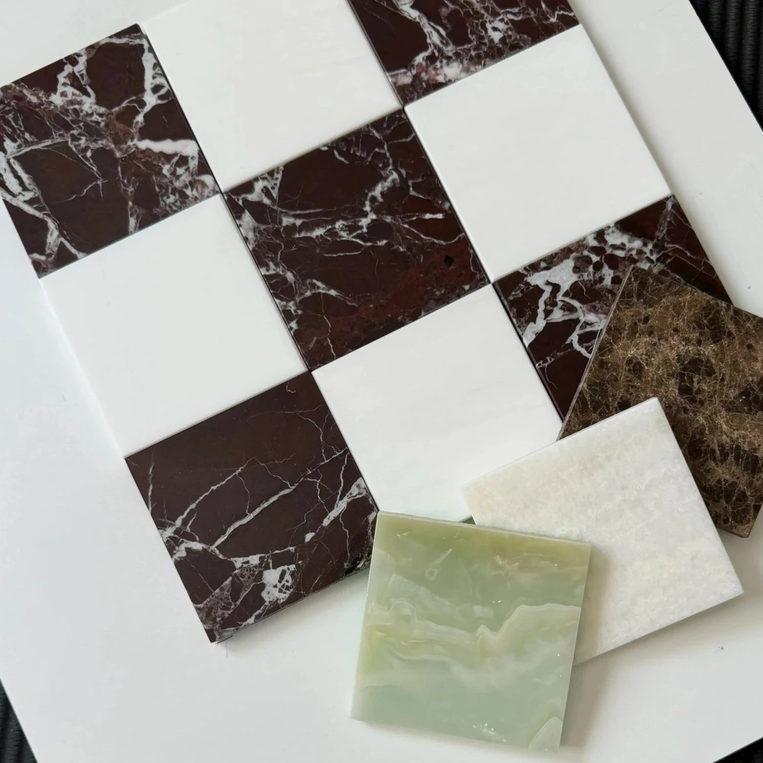 Elegant marble checkerboard pattern with deep red Rosso Levanto marble tiles and classic white Bianco Dolomite marble tiles. The dynamic color combination creates a timeless aesthetic perfect for upscale interiors or statement flooring.