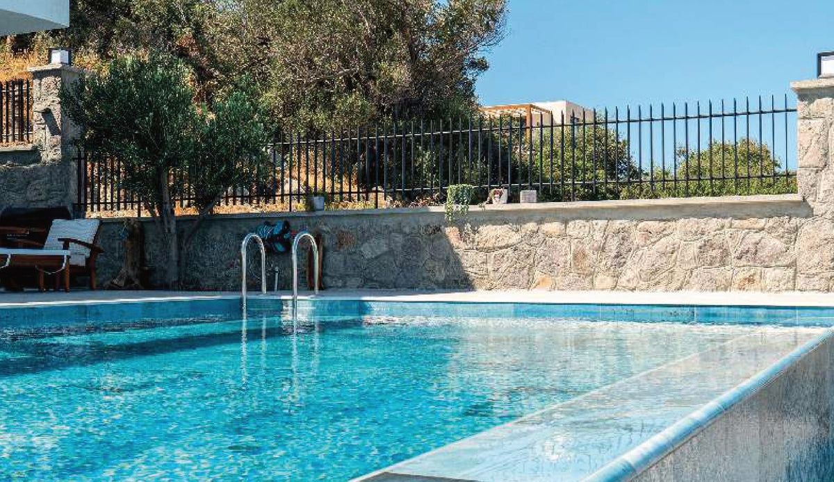SeraPool Natural Blue Bead porcelain pool tile, close-up of a finished pool surface