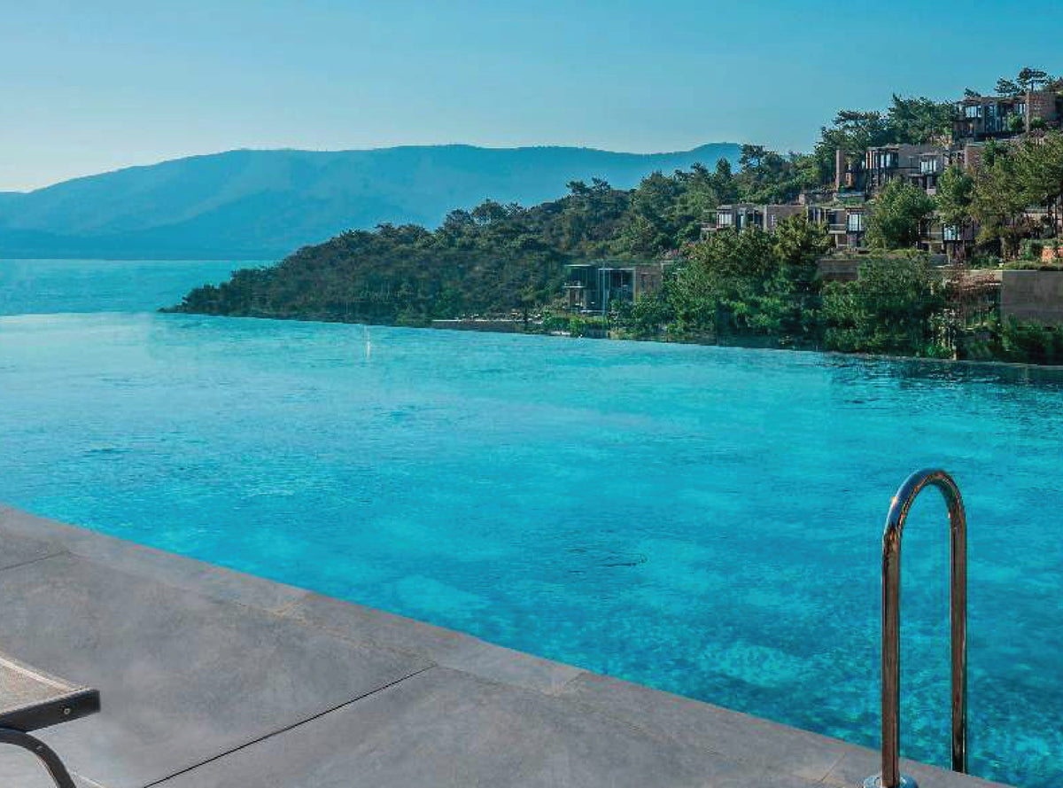 SeraPool Natural Olcay Mix porcelain pool tile installed in a finished pool project