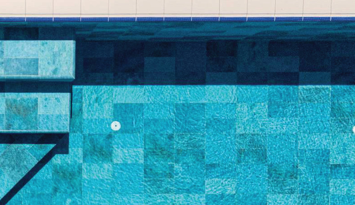 SeraPool Natural Patchwork Marin porcelain pool tile, close-up of a finished pool surface