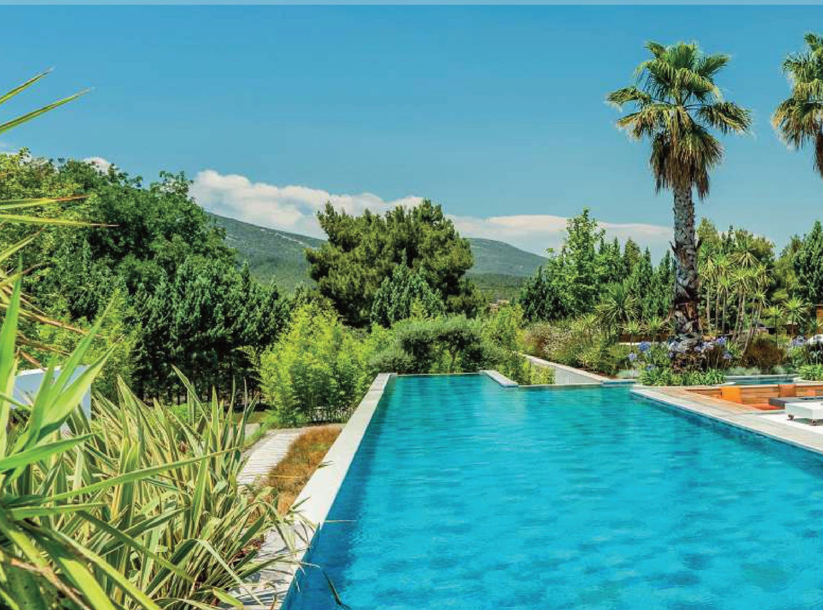 SeraPool Natural Piazza Cobalt porcelain pool tile installed in a finished pool project