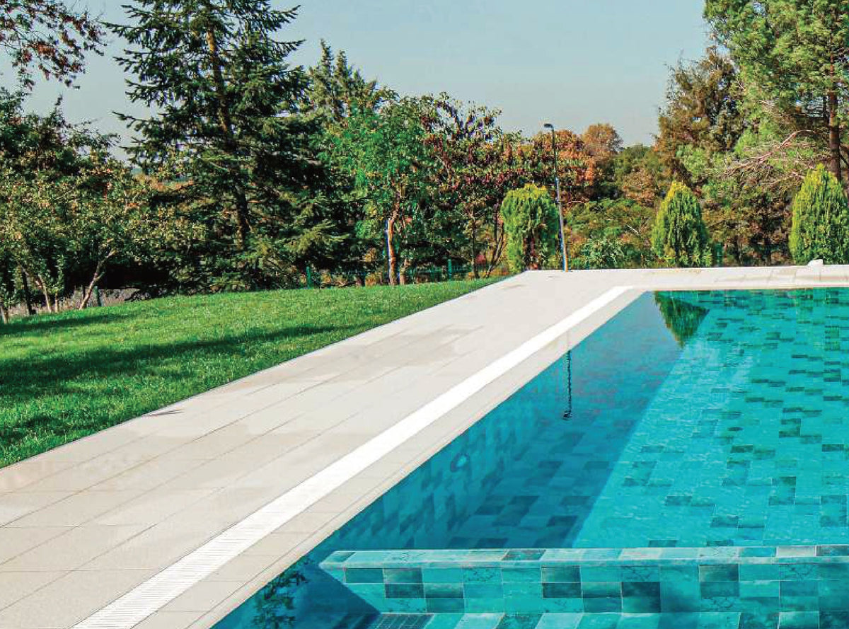 SeraPool Natural Piazza Turquoise porcelain pool tile installed in a finished pool project